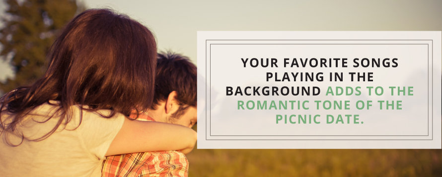 music adds to the romantic tone of the picnic date